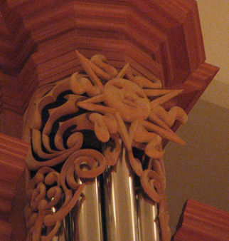 Carved sun, carvings for the organ at the Gottfried and Mary Fuchs Organ, Pacific Lutheran University, Tacoma Washington, wood carver Jude Fritts