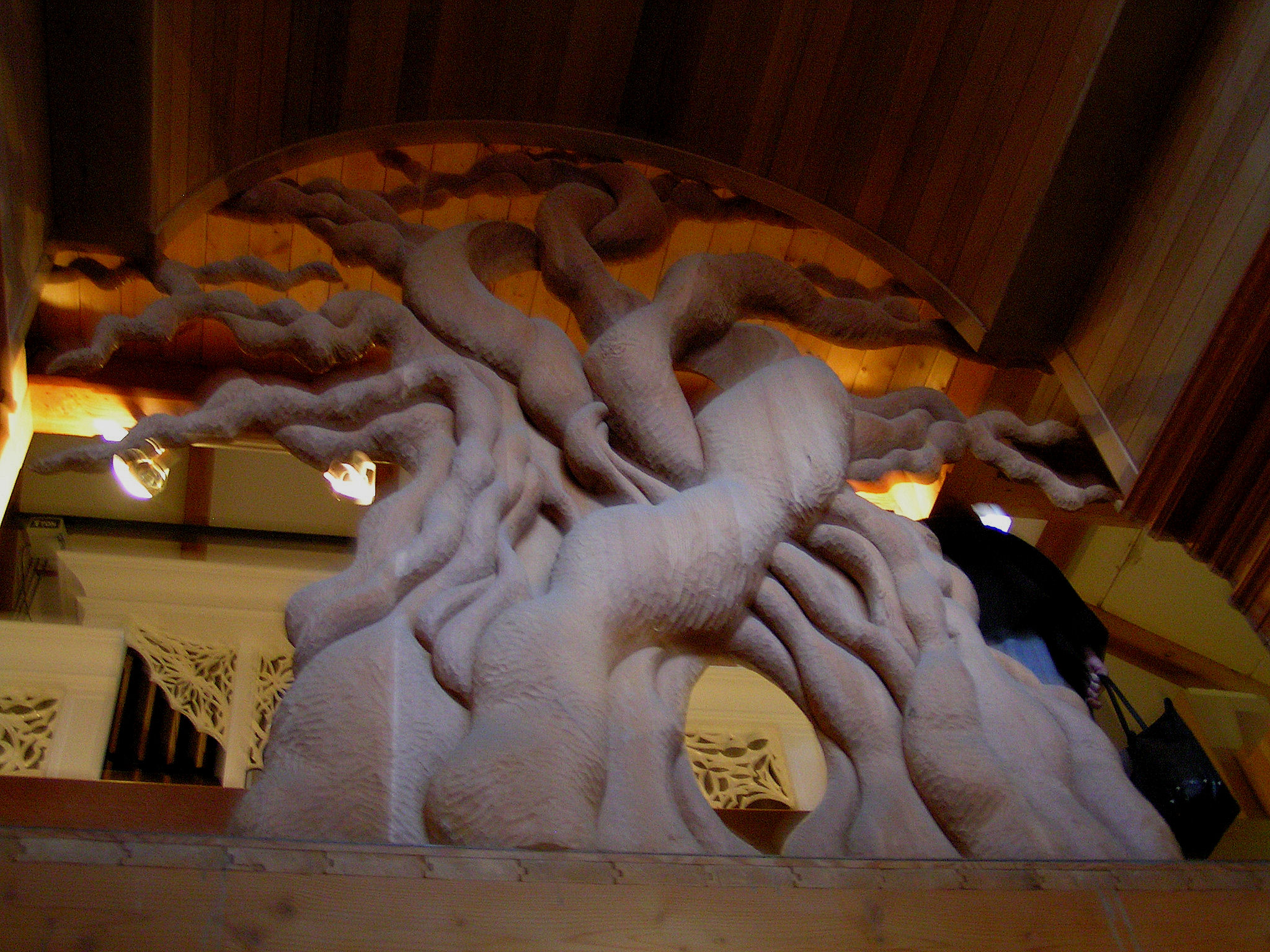 Custom sculpture of tree used as balcony railing